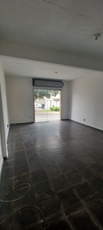 VISTO DOS FUNDOS PARA A FRENTE DA LOJA 